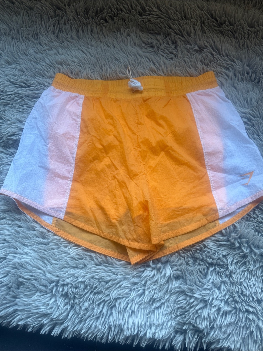 Gymshark Orange Athletic Shorts with White Side Panels